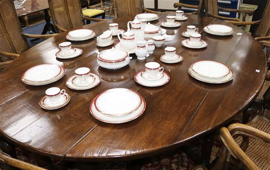 A 17th century style oak wake table on turned legs with peripheral stretcher, W.240cm